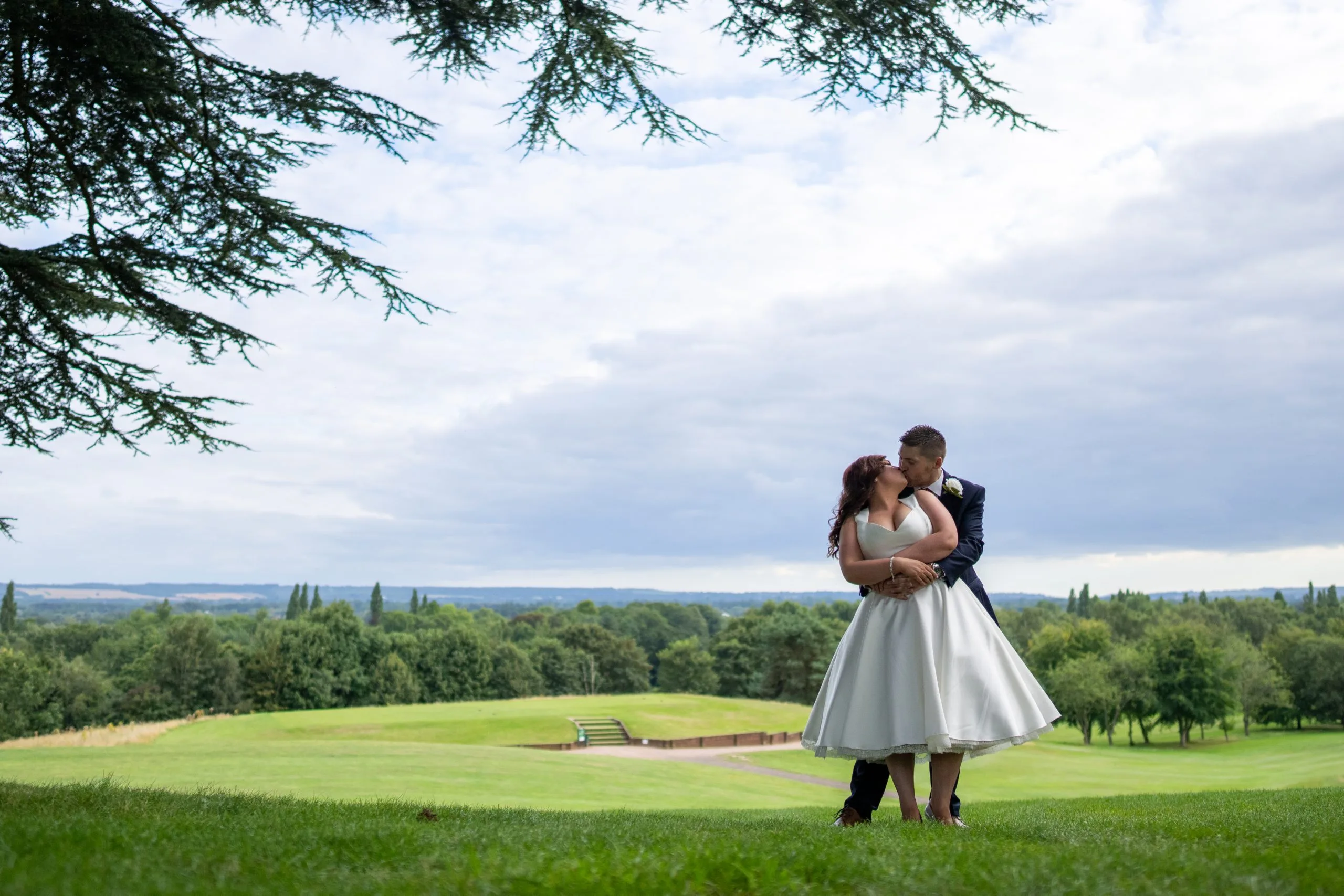 newly married couple at a wedding venue in woking on the golf course
