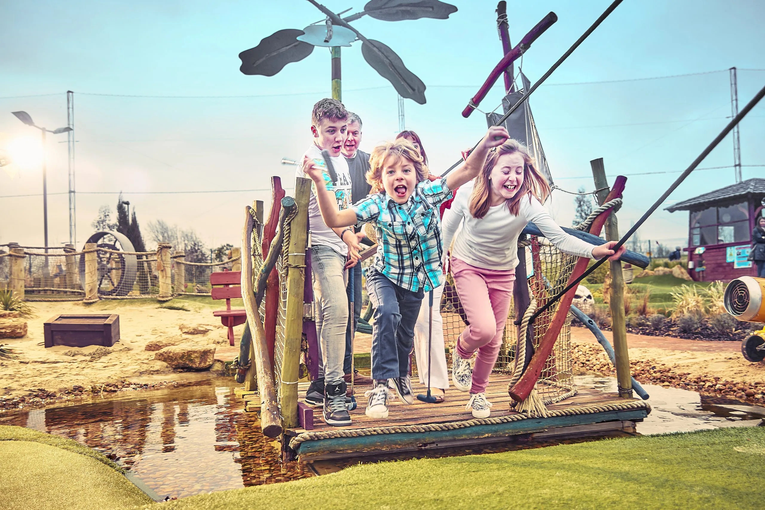 kids smiling and having fun at adventure golf in woking